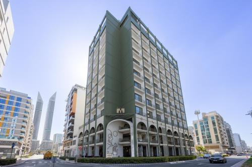 a rendering of a building in a city at Mood Living 22 in Dubai