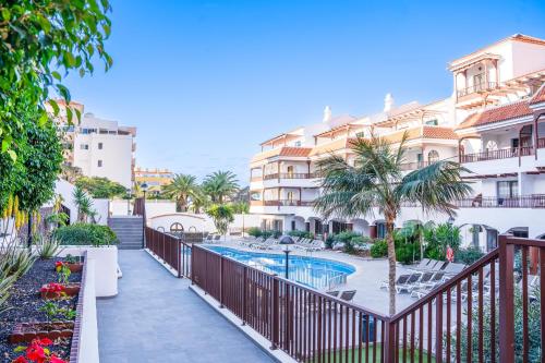 a balcony view of a hotel with a swimming pool at Coral Los Alisios in Los Cristianos