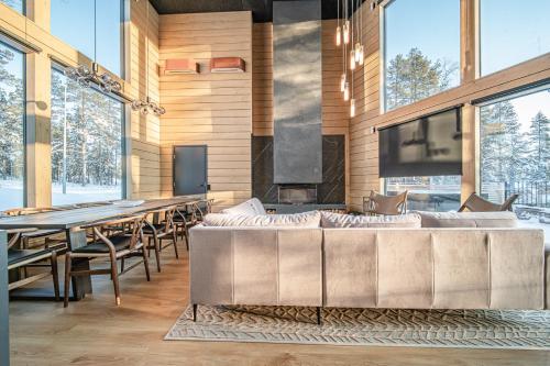 Χώρος καθιστικού στο Kaira Chalet by Aavalevi Holidays