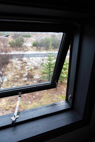 Photo de la galerie de l'établissement Cozy cabin near golden circle with panoramic views, à Mosfellsbær