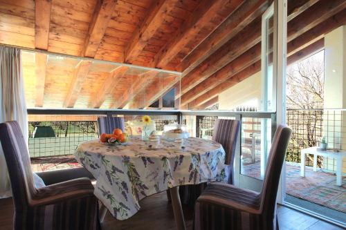 a table with fruit on it in a house at Silea Apartments, Pool, Garden, Treviso in Silea