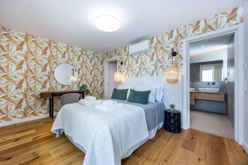 Postel nebo postele na pokoji v ubytování Ria View - Luxo a Beira Mar