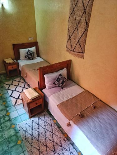 Un pat sau paturi într-o cameră la Medina house