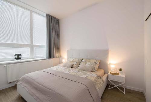 Кровать или кровати в номере Apartmány Ružomberok
