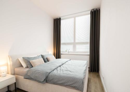 Кровать или кровати в номере Apartmány Ružomberok