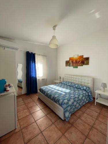 Postel nebo postele na pokoji v ubytování Scibetta's B&B