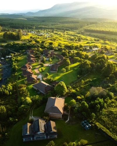 an aerial view of a park with houses and trees at Mogodi Lodge in Graskop