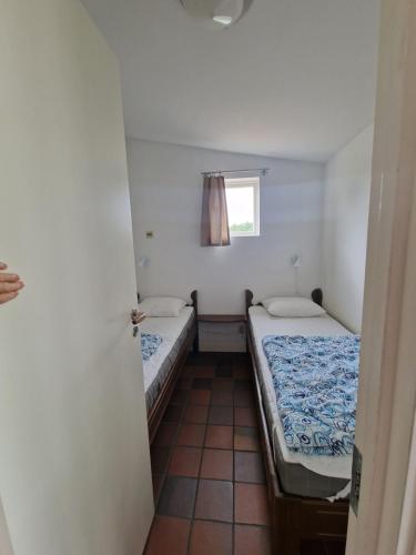 Postel nebo postele na pokoji v ubytování Mulde Gård och Fritid