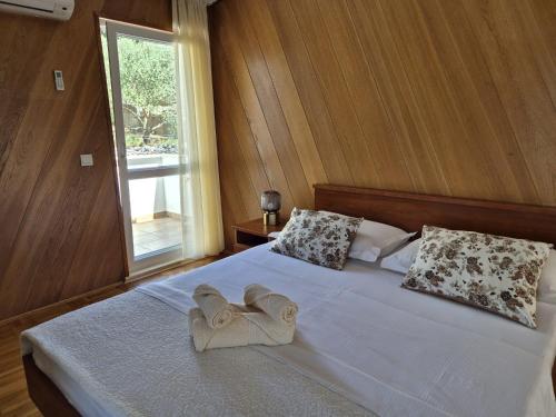 Postel nebo postele na pokoji v ubytování Apartments Vera Brela,Free private parking,sea view