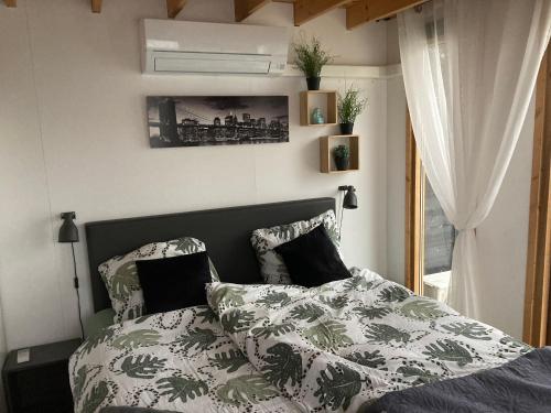 Postel nebo postele na pokoji v ubytování Bed & Breakfast ‘t Westergouwertje
