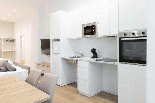 Kuchyň nebo kuchyňský kout v ubytování Luxury Apartment Oceanografic 6 pax