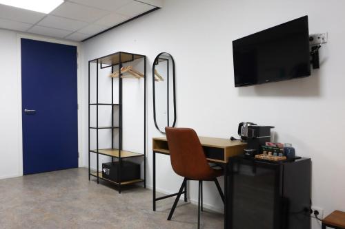 Μια τηλεόραση ή/και κέντρο ψυχαγωγίας στο Rooms25