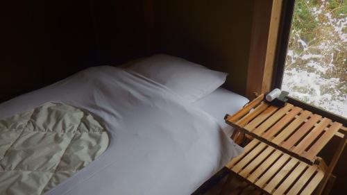 Katil atau katil-katil dalam bilik di Cosmos Guesthouse Iya Valley