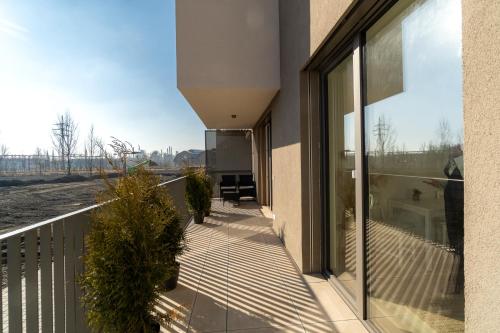 a balcony of a house with a view of the street at New BNB Apartment In the Ostrava with parking option in Slezská Ostrava