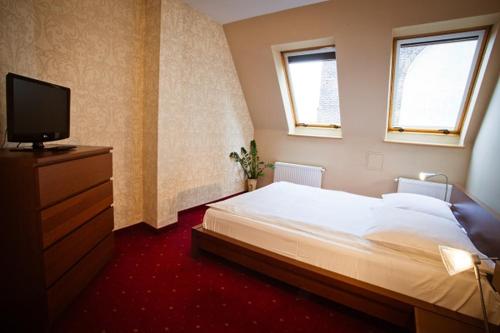 Postel nebo postele na pokoji v ubytování Tulip Hotels - Wroclaw Patio