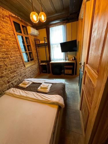 Ένα ή περισσότερα κρεβάτια σε δωμάτιο στο Berfinn Hotel Beşiktaş