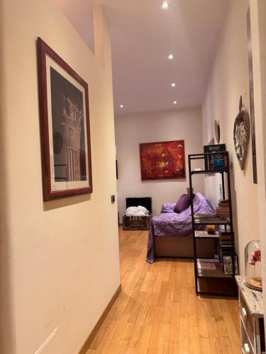 A bed or beds in a room at Roma Da Noi Suite