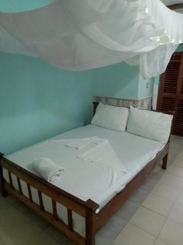 Postel nebo postele na pokoji v ubytování Beti's Resort