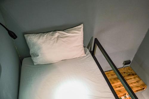 Postel nebo postele na pokoji v ubytování 62巷背包客棧 Lane62 Hostel
