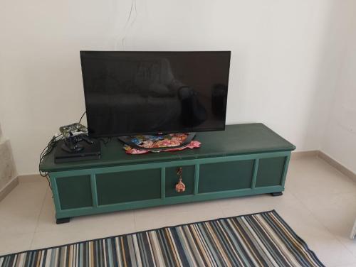 TV a/nebo společenská místnost v ubytování La casa tra gli Ulivi