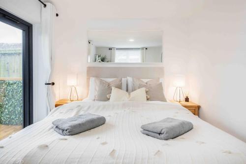 Postel nebo postele na pokoji v ubytování The Nook