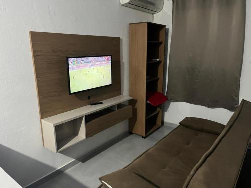 TV/trung tâm giải trí tại Kitnet Muriqui