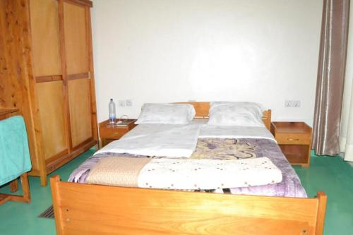 Ένα ή περισσότερα κρεβάτια σε δωμάτιο στο Quality Inn Motel Nyanza