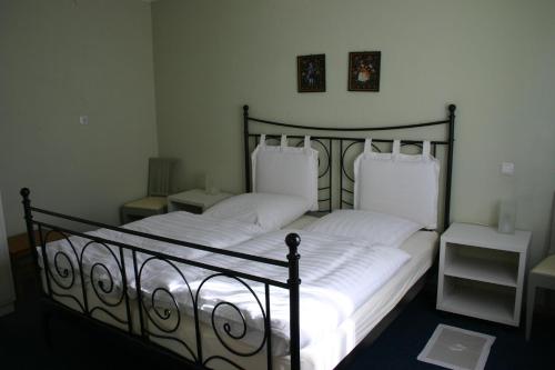 Postel nebo postele na pokoji v ubytování Bed & Kitchen Burgau