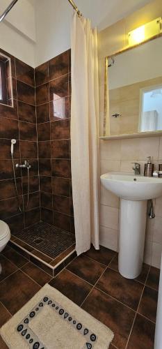 Salle de bains dans l'établissement Alex Studios