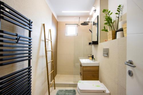 Koupelna v ubytování Bethlen Apartman