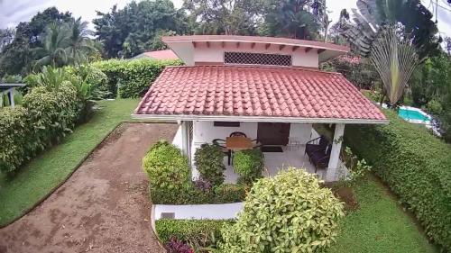 an aerial view of a house with a red roof at Casa Hibiscus in Ojochal