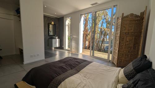 Photo de la galerie de l'établissement Villa avec piscine, bord de mer à 500m de la plage, climatisation, à Sainte-Marie-la-Mer