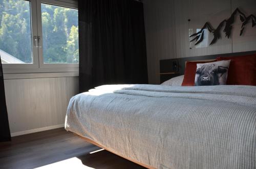 Postel nebo postele na pokoji v ubytování Q-Lodge 104