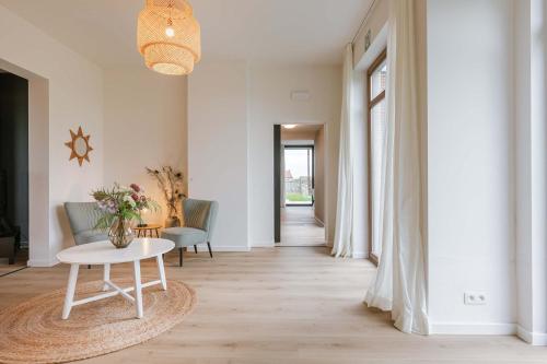 Φωτογραφία από το άλμπουμ του Huswell - Charming Vacation Home with Lush Garden σε Ledegem