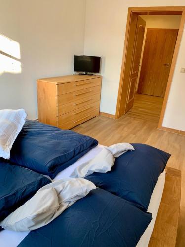 Postel nebo postele na pokoji v ubytování Familienurlaub in Niederdorla - Heimatgefühl