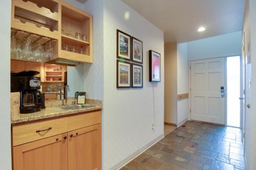a kitchen with a sink and a counter top at Deschutes River View Eagle Crest in Redmond