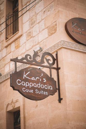 a sign on the side of a building at Karis Cave Cappadocia in Urgup