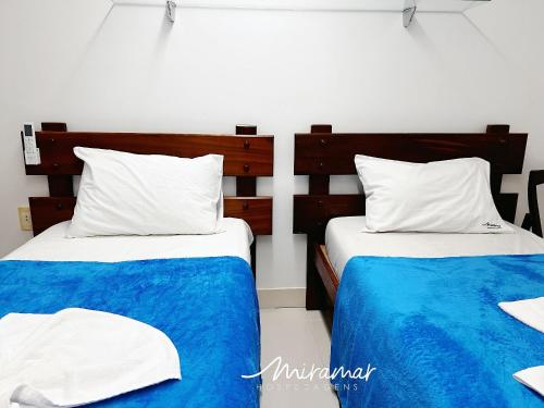 Postel nebo postele na pokoji v ubytování Pontal Cabo Branco