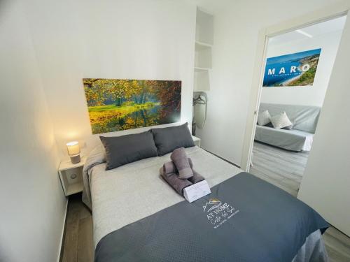 Ένα ή περισσότερα κρεβάτια σε δωμάτιο στο Apartamento Jimena Maro en el centro de Nerja
