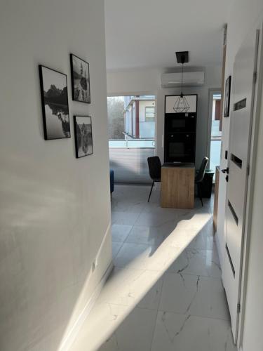 Ένα ή περισσότερα κρεβάτια σε δωμάτιο στο Dębowe Wzgórze 10