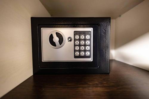 a microwave oven sitting on top of a table at City Break in Petrovaradin