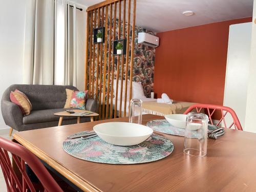 Coin salon dans l'établissement Les Quatre Ambiances - Studios