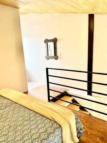 Ένα ή περισσότερα κρεβάτια σε δωμάτιο στο LOFT JUJUY 1 - Cerca del Centro!