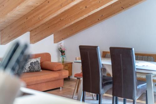 a living room with a couch and a table at Haus Birkenheim in Sölden
