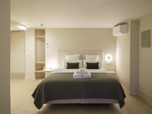 Postel nebo postele na pokoji v ubytování Lits de Lo - Boutique Rooms