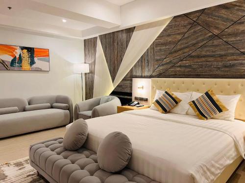 Postel nebo postele na pokoji v ubytování Amarah Hotel