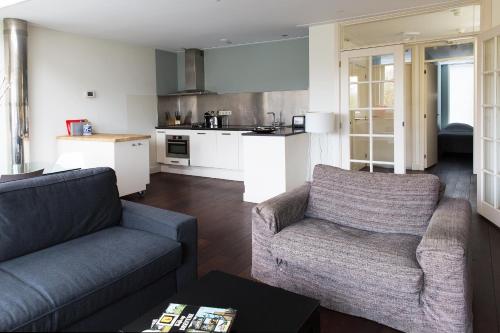 Kuchyň nebo kuchyňský kout v ubytování Marnix360apartments Top