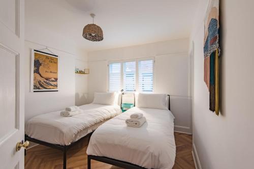 Postel nebo postele na pokoji v ubytování The Printer's Place