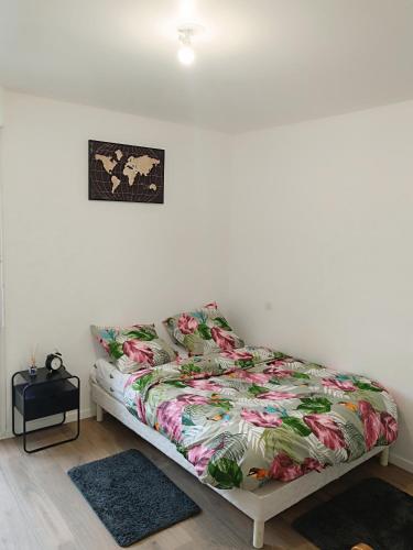 Ένα ή περισσότερα κρεβάτια σε δωμάτιο στο Chic appartement F2