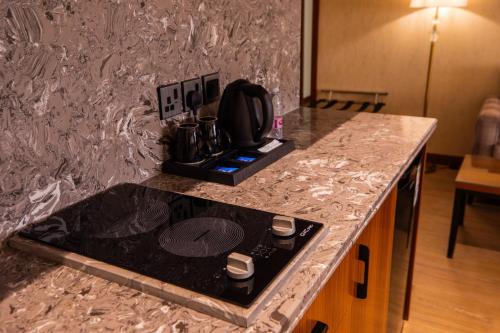 Η κουζίνα ή μικρή κουζίνα στο سويت بارك جدة - Suite Park Jeddah